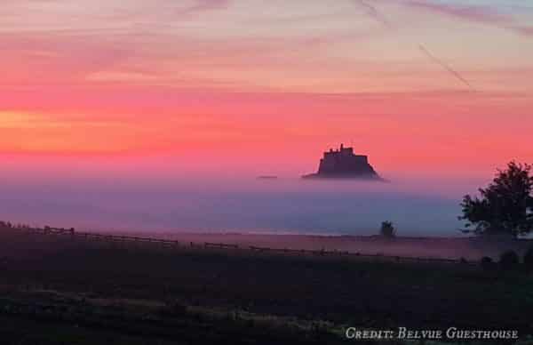 Lindisfarne Castle in the mists, for post on getting to Holy Island by public transport