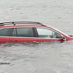 Car submerged on the Holy Island Causeway