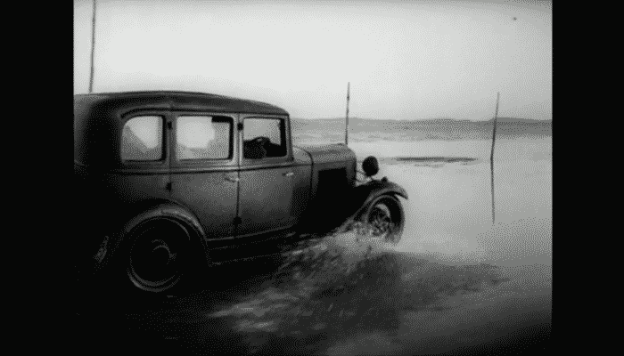 Post car drives across the sands to Holy Island