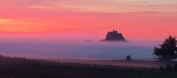 Lindisfarne Castle in the mists, for post on getting to Holy Island by public transport